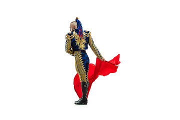 Image showing Torero in blue and gold suit or typical spanish bullfighter isolated over white