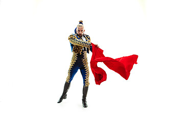 Image showing Torero in blue and gold suit or typical spanish bullfighter isolated over white