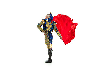 Image showing Torero in blue and gold suit or typical spanish bullfighter isolated over white