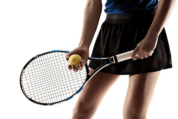 Image showing Full length portrait of young woman playing tennis isolated on white background