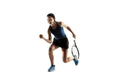 Image showing Full length portrait of young woman playing tennis isolated on white background