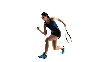 Image showing Full length portrait of young woman playing tennis isolated on white background