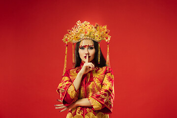 Image showing Chinese traditional woman. Beautiful young girl wearing in national costume