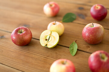 Image showing ripe red apples on wooden table