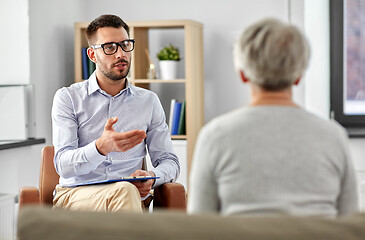 Image showing psychologist talking to senior woman patient