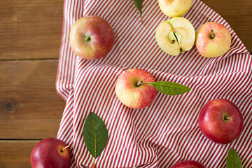 Image showing ripe red apples on wooden table