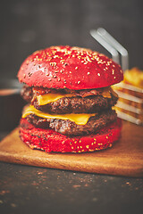 Image showing Delicious burger with red bun
