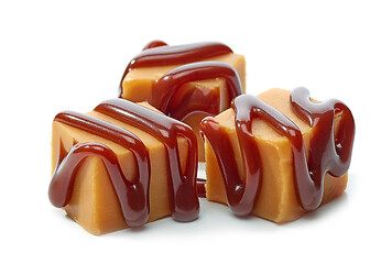 Image showing caramel candies with chocolate sauce