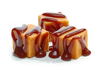 Image showing caramel candies with chocolate sauce