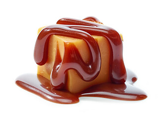 Image showing caramel candy with chocolate sauce