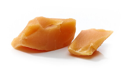 Image showing caramel pieces on white background