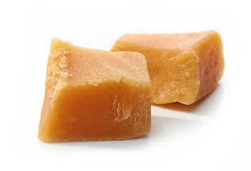 Image showing caramel pieces on white background