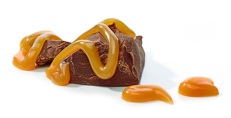 Image showing chocolate pieces with melted caramel sauce