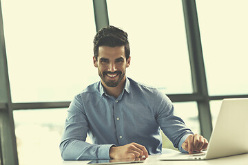 Image showing happy young business man at office