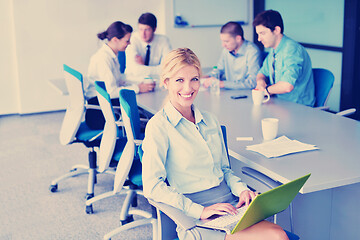 Image showing business people in a meeting at office