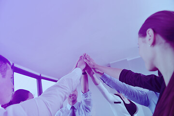 Image showing business people group joining hands