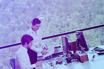 Image showing business people in a meeting at office