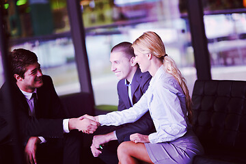 Image showing business people making deal
