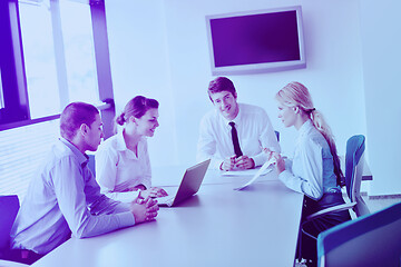 Image showing business people in a meeting at office