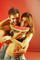 Image showing Pair with a watermellon