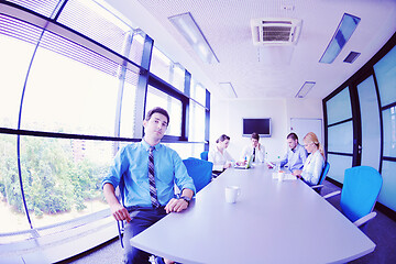 Image showing business people in a meeting at office