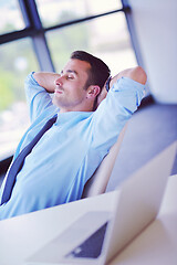 Image showing happy young business man at office