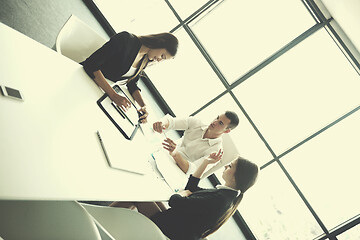 Image showing business people in a meeting at office