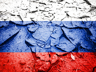 Image showing Russian flag on dry cracked earth