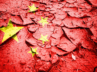 Image showing China flag on dry cracked earth