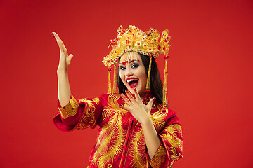 Image showing Chinese traditional woman. Beautiful young girl wearing in national costume