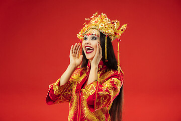 Image showing Chinese traditional woman. Beautiful young girl wearing in national costume