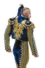 Image showing Torero in blue and gold suit or typical spanish bullfighter isol