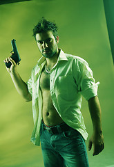 Image showing Man with a gun