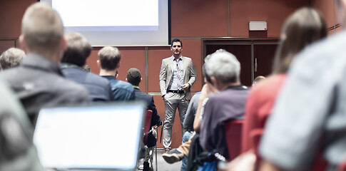 Image showing Business speaker giving a talk at business conference meeting event.