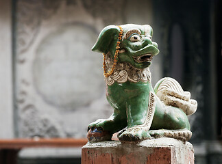 Image showing Chinese lion at the entrance of a temple