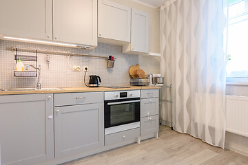 Image showing Kitchen interior with a beautiful kitchen set