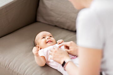 Image showing close up of mother playing with baby at home