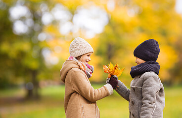 Image showing smiling children in autumn park