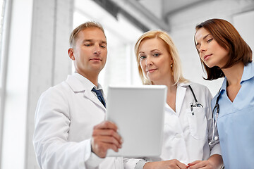 Image showing group of doctors with tablet computer at hospital