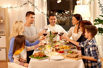 Image showing happy family having dinner party at home