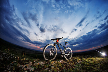 Image showing small parts of bike at the evening