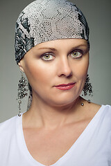 Image showing beautiful middle age woman cancer patient wearing headscarf