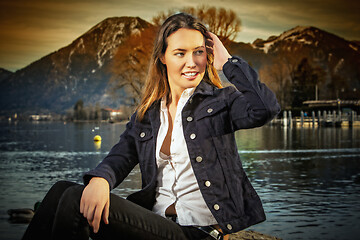 Image showing Lonely woman at the lakeside