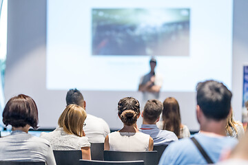 Image showing Male business speaker giving a talk at business conference event.