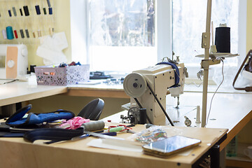 Image showing seamstresses in workshop with industrial sewing equipment