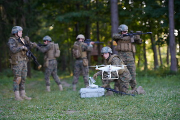 Image showing Soldiers Squad are Using Drone for Scouting