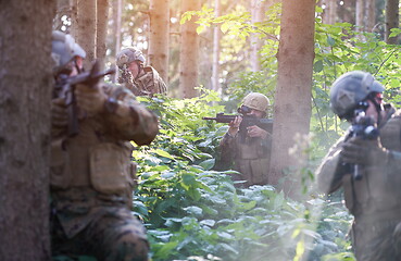 Image showing Modern warfare Soldiers  Squad  in battle