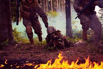 Image showing Modern warfare Soldiers  Squad  in battle