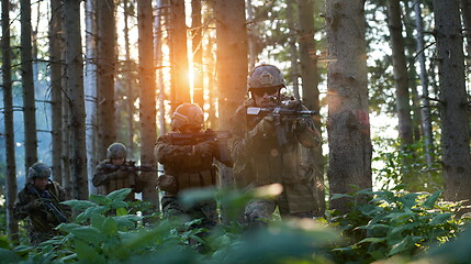 Image showing Modern warfare Soldiers  Squad  in battle