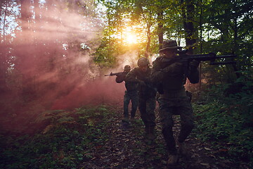 Image showing Modern warfare Soldiers  Squad  in battle